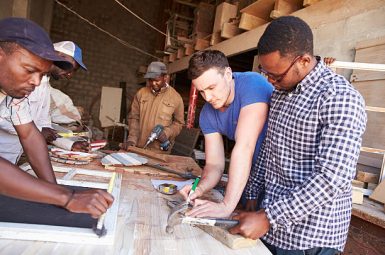 Men at work in a carpentry workshop, South Africa